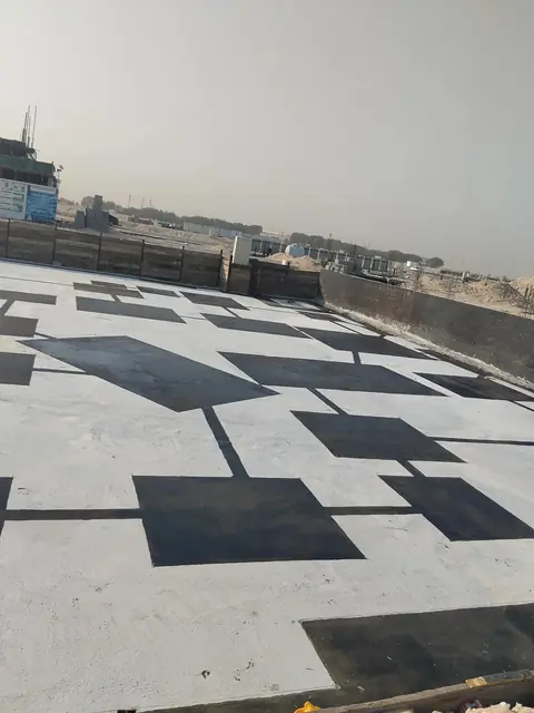 Blinding concrete with waterproofed footing pads